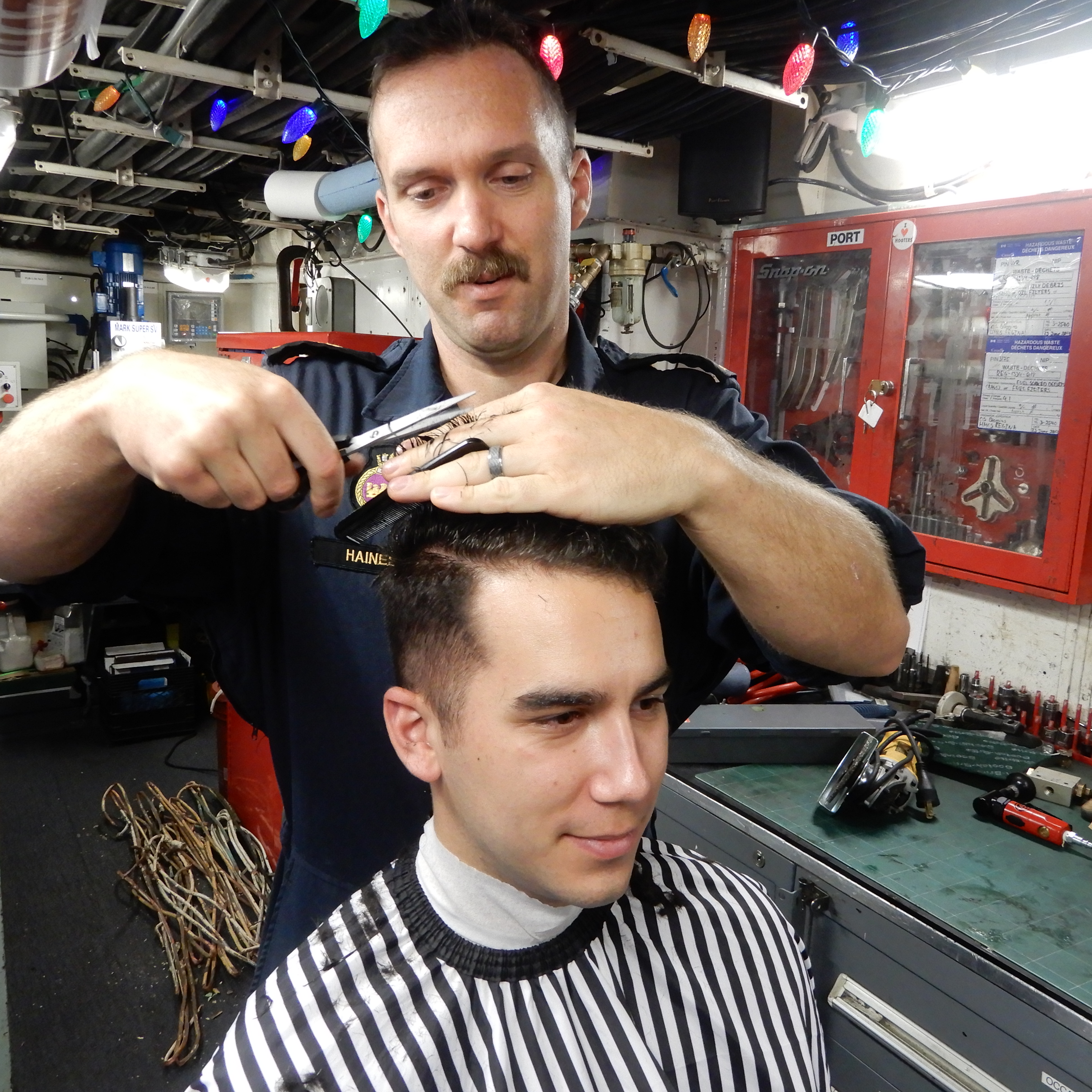 Sailor's barber shop helping kids | Trident Newspaper